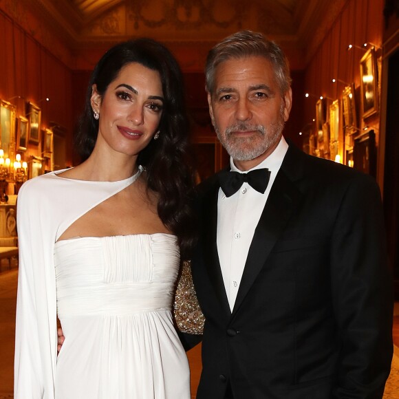 George Clooney et sa femme Amal Clooney avec le prince Charles - Dîner "The Princes Trust" au Buckingham Palace à Londres, le 12 mars 2019.