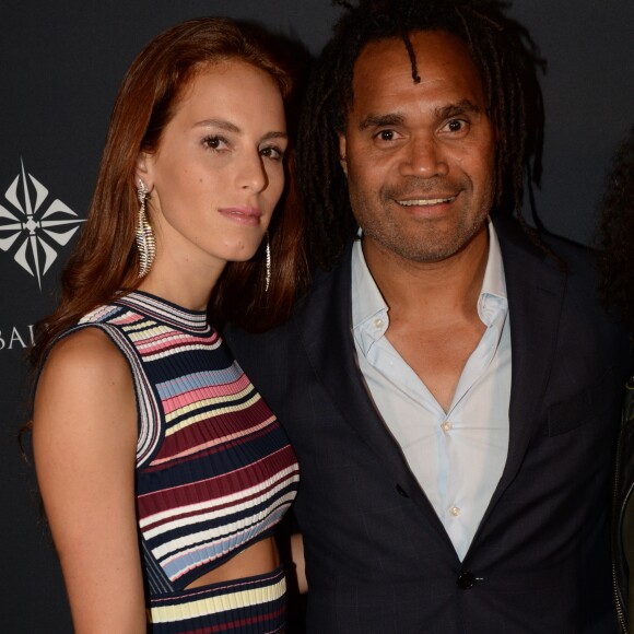 Christian Karembeu et sa femme Jackie Chamoun - A l'occasion des 20 ans de la victoire de l'équipe de France, les bleus 98 se sont rendus à un dîner organisé au Buddha Bar avec tous les joueurs et leur famille le 11 juin 2018. © Rachid Bellak/Bestimage