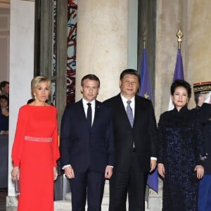 Le président de la République Emmanuel Macron et sa femme Brigitte Macron reçoivent le président de la République populaire de Chine XI Jinping et sa femme femme Peng Liyuan au palais de l'Elysée pour un dîner d'état, Paris, le 25 mars 2019. ©Dominique Jacovides / Bestimage