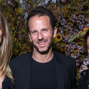 Exclusif - Laurent Milchior entre Constance Jablonski et Laetitia Casta lors de la soirée French Libertée, à Opéra, à Paris, le 21 mars 2019. Le dîner était assuré par Cyril Lignac, dans le nouveau flagship d'Etam. C'est dans les lieux nus, bruts et minimalistes, bientôt revisités par l'architecte Winy Maas (Agence MVRDV), que la marque a organisé sa French Liberté Party. Le projet a pour ambition de révéler les volumes, les formes, et la matérialité de la magnifique architecture héritée de Haussmann. L'inauguration est prévue courant de l'été 2019. © Rachid Bellak/Cyril Moreau/Bestimage