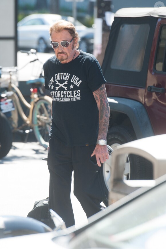 Exclusif - De retour de sa virée à moto sur les traces de "Easy Rider", Johnny Hallyday se rend à son cours de sport à Los Angeles. Le 6 octobre 2016.