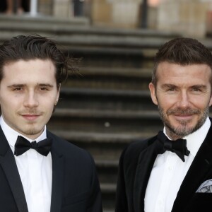 David Beckham et son fils Brooklyn à la première de la série Netflix "Our Planet" au Musée d'Histoires Naturelles à Londres, le 4 avril 2019.