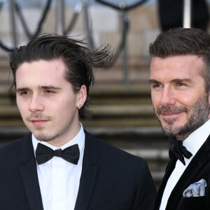 David Beckham et son fils Brooklyn à la première de la série Netflix "Our Planet" au Musée d'Histoires Naturelles à Londres, le 4 avril 2019.