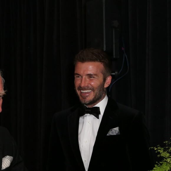 Le prince Charles, prince de Galles, David Beckham et son fils Brooklyn lors de la première de la série Netflix "Our Planet" au Musée d'Histoires Naturelles à Londres, le 4 avril 2019.