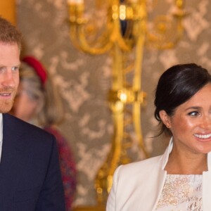 Le prince Harry, duc de Sussex, et Meghan Markle (enceinte), duchesse de Sussex - La famille royale d'Angleterre lors de la réception pour les 50 ans de l'investiture du prince de Galles au palais Buckingham à Londres. Le 5 mars 2019