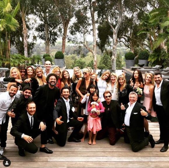 Laeticia et Johnny Hallyday avec leurs filles Jade et Joy au mariage de Jean-Claude Sindres à Los Angeles en mai 2016.