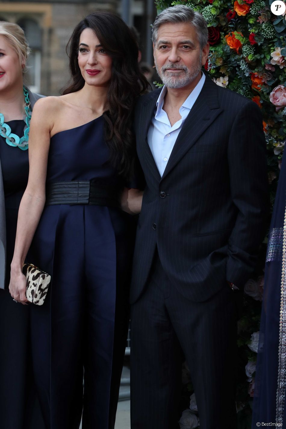 George Clooney et sa femme Amal arrivent à l&#039;événement &quot;Postcode Lottery Charity Gala&quot; au McEwan hall à Edimbourg le 14 mars 2019.