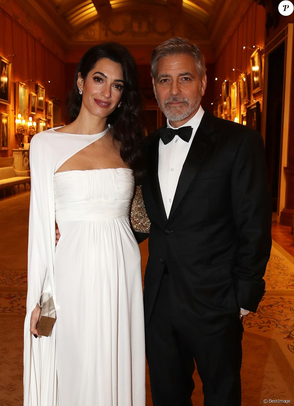 George Clooney et sa femme Amal Clooney - Dîner &quot;The Princes Trust&quot; au Buckingham Palace à Londres, le 12 mars 2019.