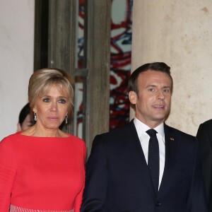 Le président de la République française Emmanuel Macron et sa femme la Première Dame Brigitte Macron - Dîner d'Etat du président de la République française en l'honneur du président de la République populaire de Chine lors de sa visite d'Etat en France du 24 au 26 mars 2019, au Palais de l'Elysée, à Paris, France, le 25 mars 2019. © Dominique Jacovides/Bestimage