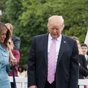 Le président Donald Trump et la première dame Melania Trump lors de la chasse annuelle d'oeuf de Pâques à la Maison Blanche à Washington le 22 avril 2019.