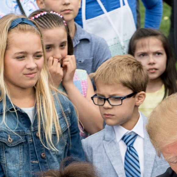 Le président Donald Trump et la première dame Melania Trump lors de la chasse annuelle d'oeuf de Pâques à la Maison Blanche à Washington le 22 avril 2019.