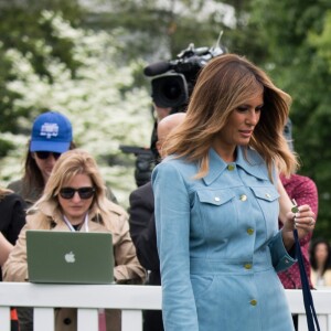 Le président Donald Trump et la première dame Melania Trump lors de la chasse annuelle d'oeuf de Pâques à la Maison Blanche à Washington le 22 avril 2019.