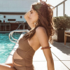 Nabilla, enceinte de 4 mois, pose en maillot de bain. Avril 2019.
