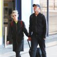 Anthony Martial et Mélanie Da Cruz à l'aéroport de Manchester après un voyage à Dubaï le 25 mars 2019.