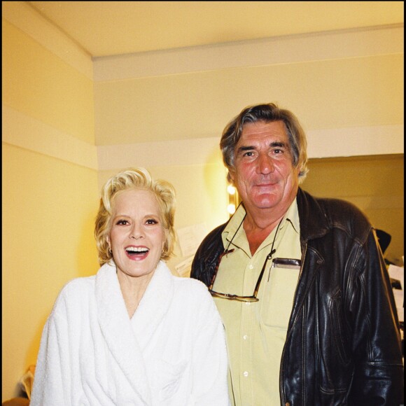 Sylvie Vartan et Jean-Claude Brisseau dans sa loge à l'Olympia le 28 octobre 1999.