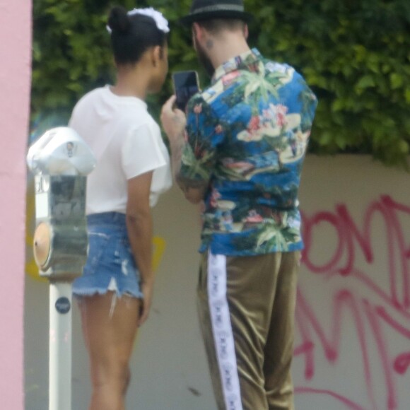 Exclusif - Christina Milian et son compagnon M. Pokora ont été aperçus en train de prendre des photos dans les rues de Los Angeles, le 11 mai 2019.