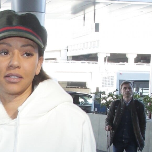 Mel B (Melanie Brown) arrive à l'aéroport de LAX à Los Angeles, le 20 mars 2019.