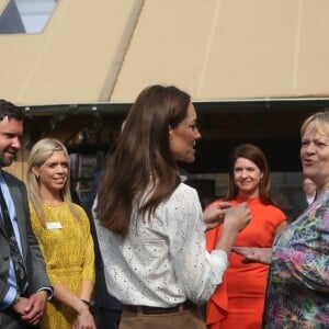 Kate Middleton, duchesse de Cambridge, a accueilli des écoliers dans son jardin baptisé "Back to Nature" au "Chelsea Flower Show 2019" à Londres, le 20 mai 2019, premier jour de l'exposition florale.