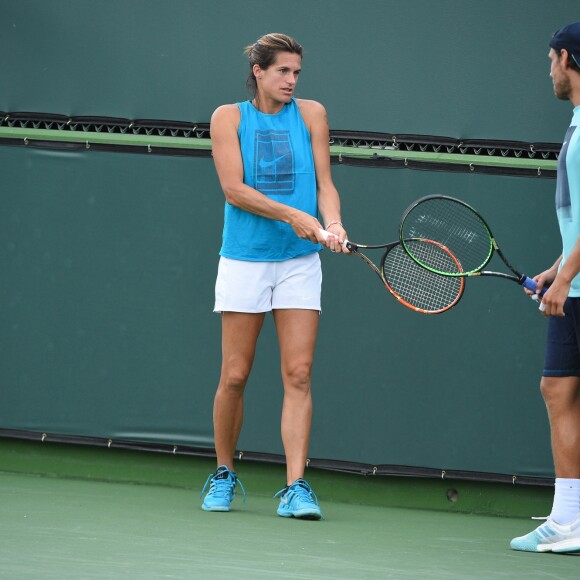 Amélie Mauresmo à l'entraînement avec Lucas Pouille lors du tournoir d'Indian Wells, le 5 mars 2019.