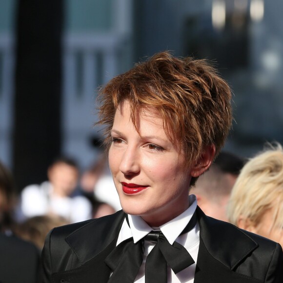 Natacha Polony (habillée en Karl Lagerfeld) - Montée des marches du film "Sils Maria" lors du 67 ème Festival du film de Cannes – Cannes le 23 mai 2014.