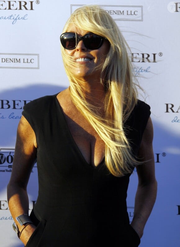 Dina Lohan - Soirée "Ranbeeri Denim" (marque dont Ali Lohan est l'égérie) au rooftop Jimmy du James Hotel à New York, le 4 août 2015.