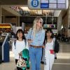 Semi-exclusif - Laeticia Hallyday et ses filles Jade et Joy arrivent à l'aéroport de LAX à Los Angeles pour prendre un vol pour la France le 14 juin 2019. Laeticia a enregistré ses baggages au comptoir d'Air France avant de retirer de l'argent à un distributeur automatique de billets pour donner un pourboire au porteur de ses valises. Laeticia Hallyday sera présente le samedi 15 juin à Toulouse pour l'inauguration de l'esplanade qui portera le nom de Johnny Hallyday, devant la salle de concert du Zénith. Elle passera par la suite une dizaine de jours en France avant de repartir pour Saint-Barthélemy.