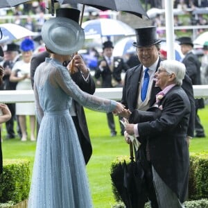 Kate Middleton, duchesse de Cambridge (en robe Elie Saab), et le prince William au Royal Ascot le 18 juin 2019.