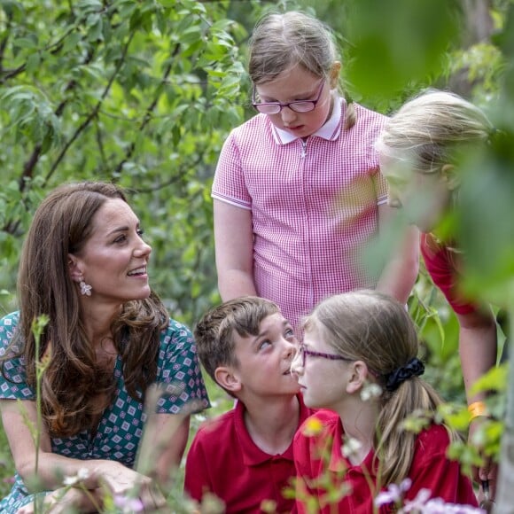 Catherine (Kate) Middleton, duchesse de Cambridge, invite les enfants du centre Anna Freud, de l'hôpital Evelina pour enfants, de Action for Children et de Place2Be à se joindre à elle pour un pique-nique suivi d'une chasse au trésor et une identification d'insectes. Dans le cadre de son programme pour inciter les familles et les communautés à passer du temps en plein air, le jardin RHS Back to Nature de la Duchesse de Cambridge sera transféré au festival RHS Garden Garden Festival. Londres, le 1er juillet 2019.