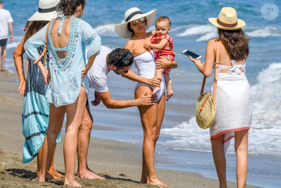 Eva Longoria, son mari Jose Baston et leur fils Santiago passent des vacances à Marbella, Espagne, le 9 juillet 2019.