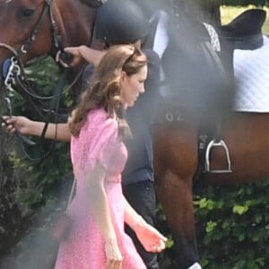 Kate Middleton et son fils le prince Louis au King Power Royal Charity Polo Day à Wokingham, dans le Berkshire, le 10 juillet 2019. Les princes Harry et William étaient le terrain, tandis que Meghan Markle pouponnait avec Archie.