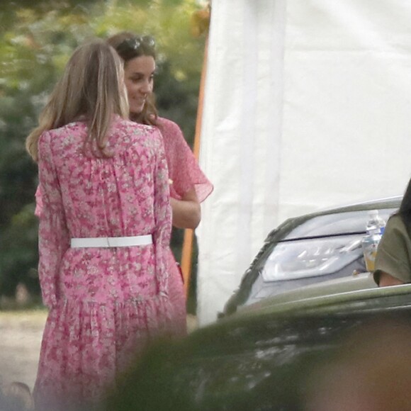 Meghan Markle et son fils Archie, 2 mois, au King Power Royal Charity Polo Day à Wokingham, dans le Berkshire, le 10 juillet 2019. Les princes Harry et William étaient le terrain, tandis que Kate Middleton s'occupait de ses trois enfants, George, Charlotte et Louis.