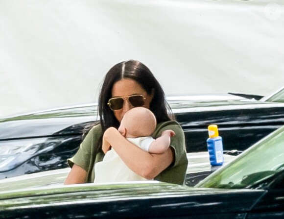 Meghan Markle, duchesse de Sussex et son fils Archie Harrison Mountbatten-Windsor lors d'un match de polo de bienfaisance King Power Royal Charity Polo Day à Wokinghan, comté de Berkshire, Royaume Uni, le 10 juillet 2019.