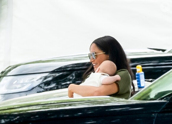 Meghan Markle, duchesse de Sussex et son fils Archie Harrison Mountbatten-Windsor lors d'un match de polo de bienfaisance King Power Royal Charity Polo Day à Wokinghan, comté de Berkshire, Royaume Uni, le 10 juillet 2019.
