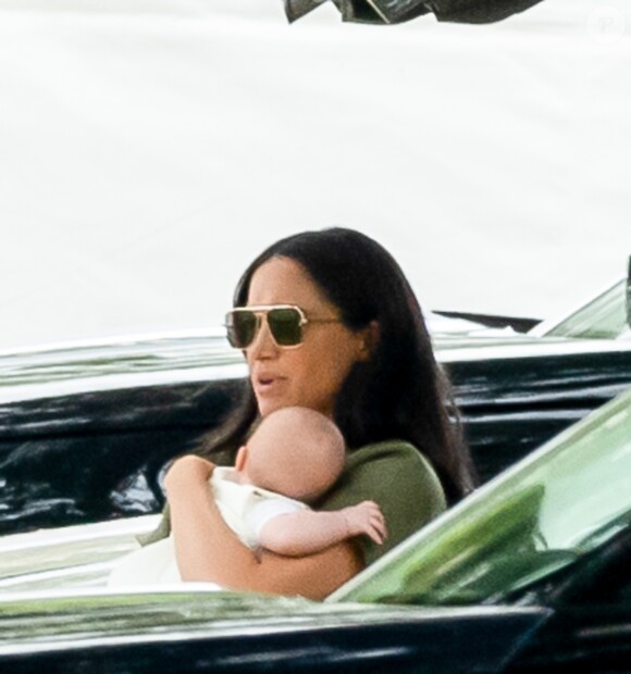 Meghan Markle, duchesse de Sussex et son fils Archie Harrison Mountbatten-Windsor lors d'un match de polo de bienfaisance King Power Royal Charity Polo Day à Wokinghan, comté de Berkshire, Royaume Uni, le 10 juillet 2019.