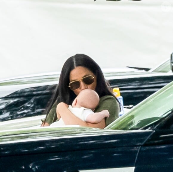 Meghan Markle, duchesse de Sussex et son fils Archie Harrison Mountbatten-Windsor lors d'un match de polo de bienfaisance King Power Royal Charity Polo Day à Wokinghan, comté de Berkshire, Royaume Uni, le 10 juillet 2019.