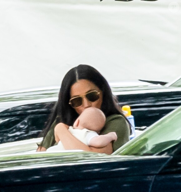 Meghan Markle, duchesse de Sussex et son fils Archie Harrison Mountbatten-Windsor lors d'un match de polo de bienfaisance King Power Royal Charity Polo Day à Wokinghan, comté de Berkshire, Royaume Uni, le 10 juillet 2019.