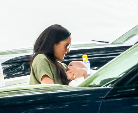 Meghan Markle, duchesse de Sussex et son fils Archie Harrison Mountbatten-Windsor lors d'un match de polo de bienfaisance King Power Royal Charity Polo Day à Wokinghan, comté de Berkshire, Royaume Uni, le 10 juillet 2019.