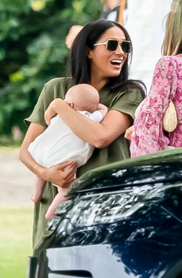 Meghan Markle, duchesse de Sussex et son fils Archie Harrison Mountbatten-Windsor lors d'un match de polo de bienfaisance King Power Royal Charity Polo Day à Wokinghan, comté de Berkshire, Royaume Uni, le 10 juillet 2019.