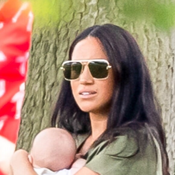 Meghan Markle, duchesse de Sussex, son fils Archie Harrison Mountbatten-Windsor et Catherine (Kate) Middleton, duchesse de Cambridge lors d'un match de polo de bienfaisance King Power Royal Charity Polo Day à Wokinghan, comté de Berkshire, Royaume Uni, le 10 juillet 2019.