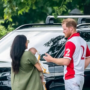 Le prince Harry, duc de Sussex, Meghan Markle, duchesse de Sussex et leur fils Archie Harrison Mountbatten-Windsor lors d'un match de polo de bienfaisance King Power Royal Charity Polo Day à Wokinghan, comté de Berkshire, Royaume Uni, le 10 juillet 2019.