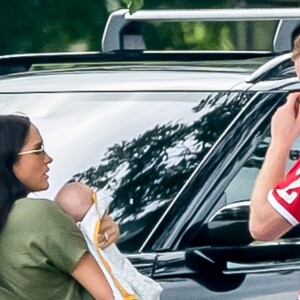 Le prince Harry, duc de Sussex, Meghan Markle, duchesse de Sussex et leur fils Archie Harrison Mountbatten-Windsor lors d'un match de polo de bienfaisance King Power Royal Charity Polo Day à Wokinghan, comté de Berkshire, Royaume Uni, le 10 juillet 2019.