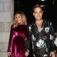 Robbie Williams et sa femme Ayda Field à la sortie du club "Annabel's" où ils ont célébrer l'anniversaire de L. Silverman. Londres, le 25 juillet 2018.
