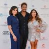 Lana Parrilla, Maria Bravo (co-fondatrice de la Fondation Global Gift) et Gary Dourdan lors du défilé organisé par la fondation "Global Gift" dans le cadre de la Fashion Week de Marbella, le 11 juillet 2019.
