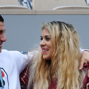 Exclusif - Marion Bartoli et Yahya Boumediene s'embrassent dans les tribunes des Internationaux de France de Tennis de Roland Garros à Paris. 22 mai 2019.