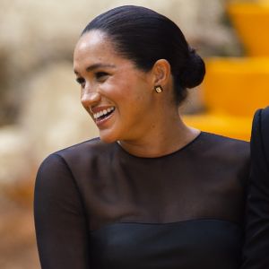 Meghan Markle, duchesse de Sussex, avec le prince Harry lors de la première du film Le Roi Lion au cinéma Odeon Luxe Leicester Square à Londres, le 14 juillet 2019.