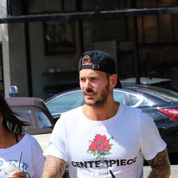 Matt Pokora, sa compagne Christina Milian enceinte et sa fille Violet Nash - Enceinte et radieuse, C.Milian se rend au glacier McConnell avec compagnon M.Pokora et sa fille V.Nash pour le goûter après avoir acheté des vêtements pour bébés. La chanteuse 'Dip it Low' et son compagnon ont annoncé sa grossesse la semaine dernière via Instagram. C'est le premier enfant du couple et le premier enfant de M.Pokora. Los Angeles, le 3 août 2019.
