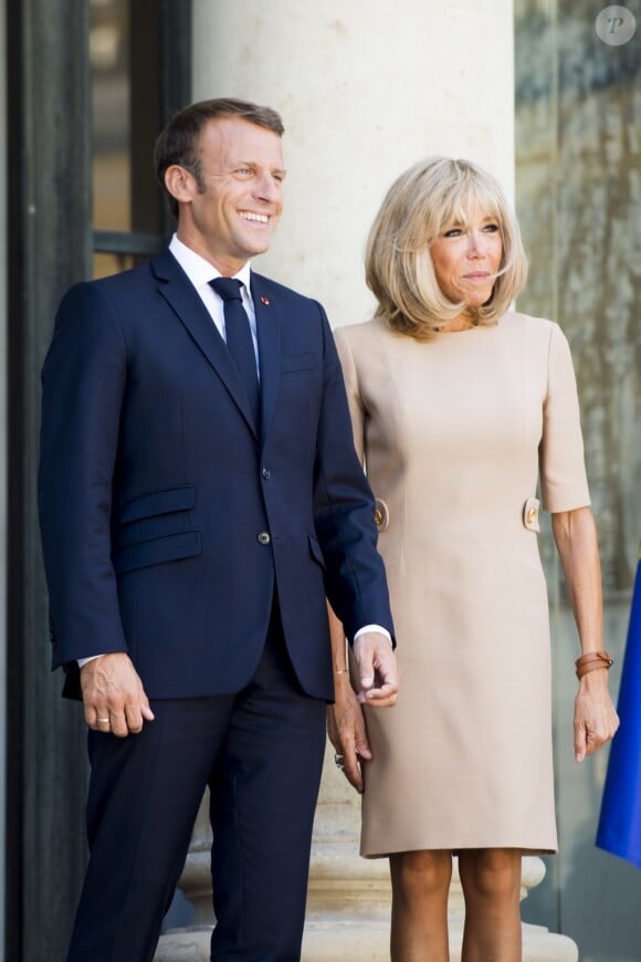 Le président Emmanuel Macron et la première dame Brigitte Macron - Le président de la République française reçoit le premier ministre de la République Hellénique au palais de l'Elysée à Paris le 22 août 2019. © JB Autissier / Panoramic / Bestimage