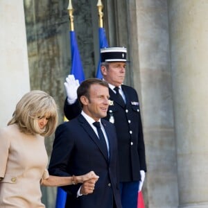 Le président Emmanuel Macron et la première dame Brigitte Macron - Le président de la République française reçoit le premier ministre de la République Hellénique au palais de l'Elysée à Paris le 22 août 2019. © JB Autissier / Panoramic / Bestimage