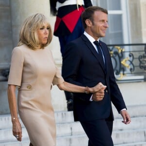 Le président Emmanuel Macron et la première dame Brigitte Macron - Le président de la République française reçoit le premier ministre de la République Hellénique au palais de l'Elysée à Paris le 22 août 2019. © JB Autissier / Panoramic / Bestimage