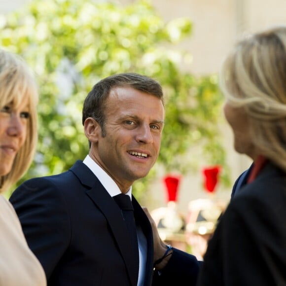 La première dame Brigitte Macron, le président Emmanuel Macron, Kyriakos Mitsotakis, premier ministre de la République Hellénique et sa femme Mareva Grabowski - Le président de la République française reçoit le premier ministre de la République Hellénique au palais de l'Elysée à Paris le 22 août 2019. © JB Autissier / Panoramic / Bestimage